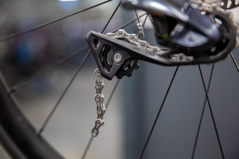 After loosening the chain, you can remove it from the derailleur.
